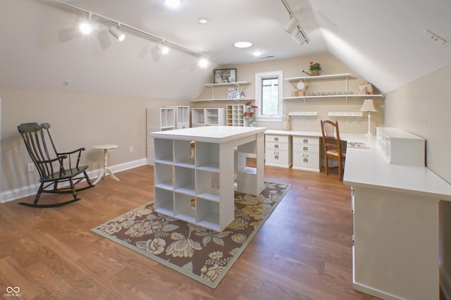 1614 Rosebud Ln Unit 83, Greenwood, IN 46143 - bonus room featuring vaulted ceiling, dark wood-style flooring, and baseboards