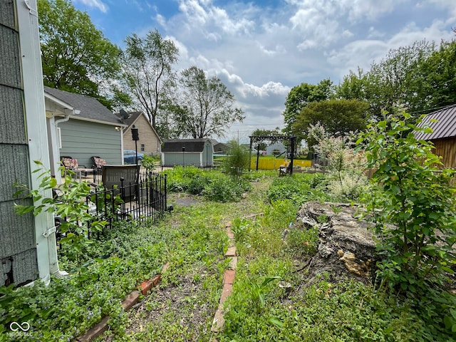 view of yard with fence