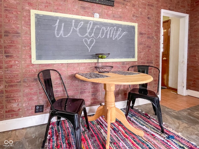 dining room featuring baseboards