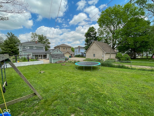 view of yard with a trampoline