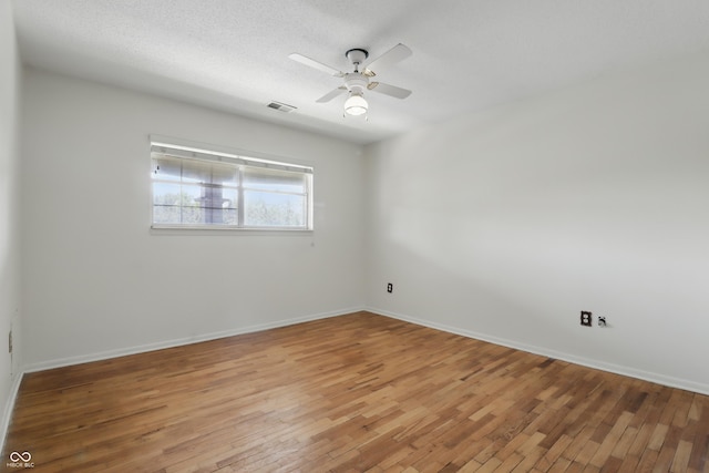 5038 Allisonville Rd Unit E, Indianapolis, IN 46205 - unfurnished room featuring light wood-style flooring, a ceiling fan, and baseboards
