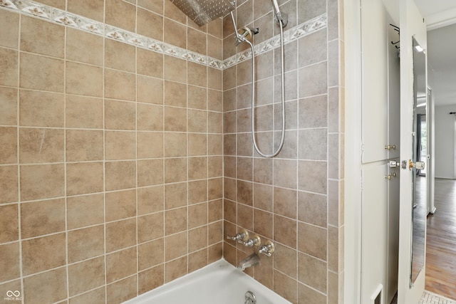 5038 Allisonville Rd Unit E, Indianapolis, IN 46205 - bathroom with shower / washtub combination and wood finished floors