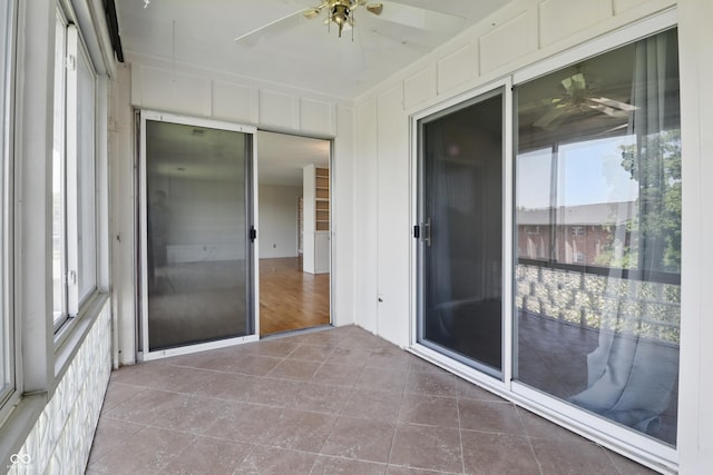 5038 Allisonville Rd Unit E, Indianapolis, IN 46205 - unfurnished sunroom with healthy amount of natural light and tile patterned floors