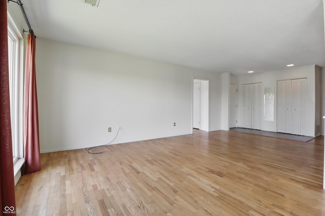 5038 Allisonville Rd Unit E, Indianapolis, IN 46205 - unfurnished room with light wood-type flooring and recessed lighting