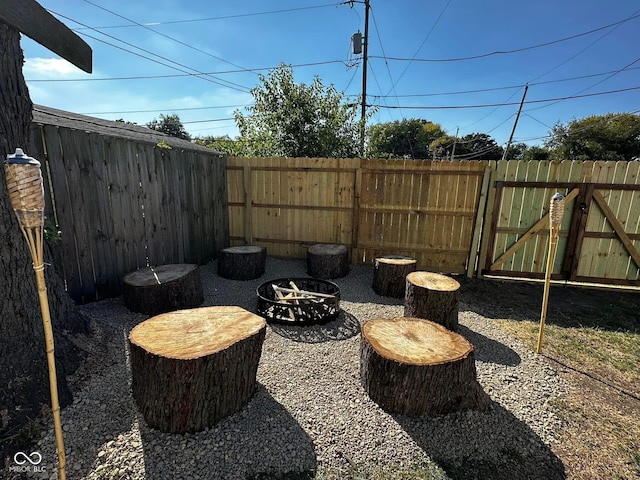 426 St Paul St, Indianapolis, IN 46201 - view of patio with an outdoor fire pit and fence