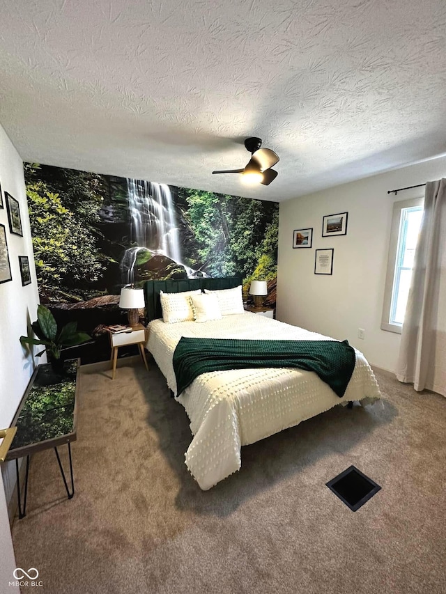 426 St Paul St, Indianapolis, IN 46201 - bedroom with a textured ceiling, carpet flooring, and ceiling fan