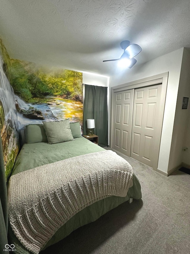 426 St Paul St, Indianapolis, IN 46201 - bedroom with carpet, a closet, ceiling fan, baseboards, and a textured ceiling