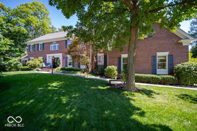 11536 Woods Bay Ln, Indianapolis, IN 46236 - colonial home featuring a front lawn and brick siding