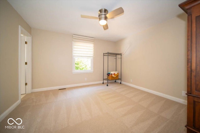 11536 Woods Bay Ln, Indianapolis, IN 46236 - unfurnished room with ceiling fan, light carpet, and baseboards