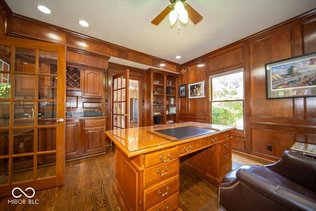 11536 Woods Bay Ln, Indianapolis, IN 46236 - office space featuring a ceiling fan, dark wood-style flooring, wooden walls, and ornamental molding