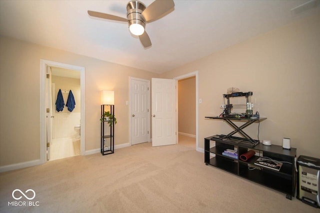 11536 Woods Bay Ln, Indianapolis, IN 46236 - carpeted bedroom with baseboards, ensuite bathroom, and a ceiling fan