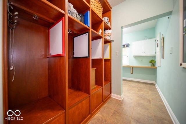 11536 Woods Bay Ln, Indianapolis, IN 46236 - mudroom with light tile patterned flooring and baseboards