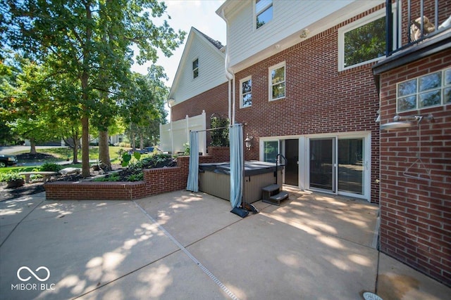 11536 Woods Bay Ln, Indianapolis, IN 46236 - view of patio featuring a hot tub