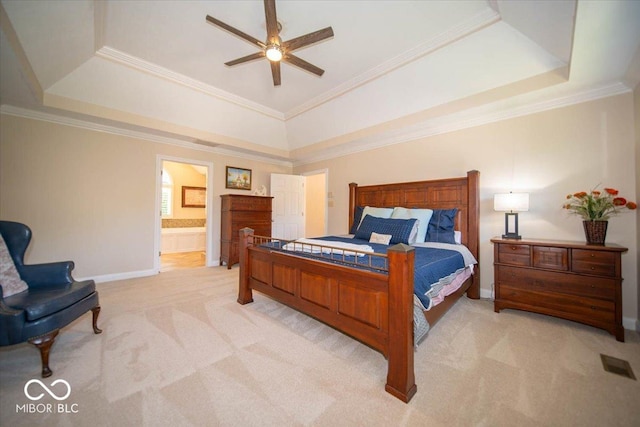 11536 Woods Bay Ln, Indianapolis, IN 46236 - bedroom with a tray ceiling, light colored carpet, ensuite bathroom, ornamental molding, and baseboards