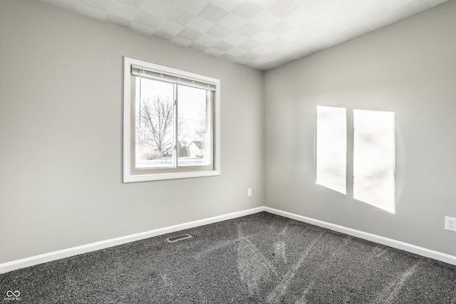 8510 E Mcgregor Rd, Indianapolis, IN 46259 - spare room featuring dark carpet and baseboards