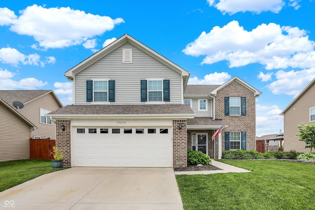 traditional-style home featuring brick siding, a garage, driveway, and roof with shingles