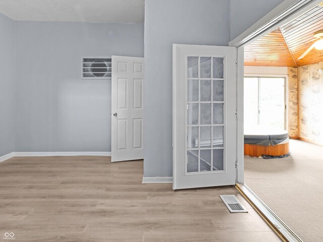 1225 S Monroe St, Muncie, IN 47302 - doorway with wood finished floors and baseboards