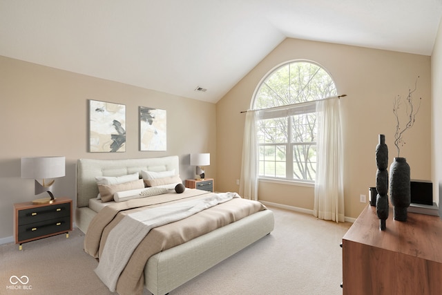 11438 Winding Wood Dr, Indianapolis, IN 46235 - bedroom featuring light colored carpet, multiple windows, vaulted ceiling, and baseboards