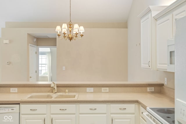 11438 Winding Wood Dr, Indianapolis, IN 46235 - kitchen with white appliances, a sink, a chandelier, light countertops, and white cabinetry