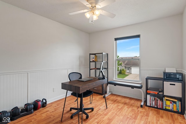8238 Crackling Ln, Indianapolis, IN 46259 - home office with wood finished floors, wainscoting, and a ceiling fan