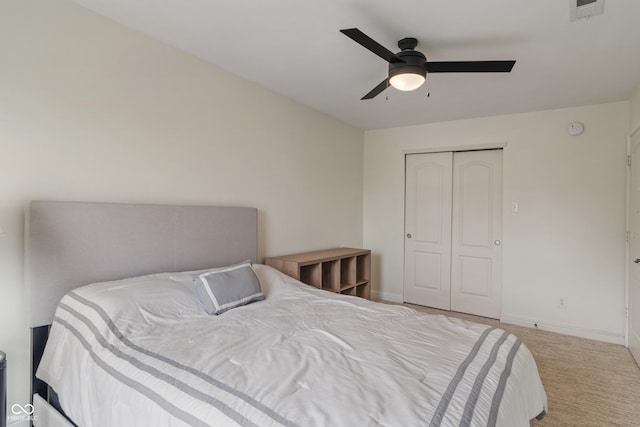 8238 Crackling Ln, Indianapolis, IN 46259 - carpeted bedroom with baseboards, a closet, and ceiling fan