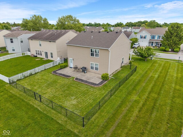 8238 Crackling Ln, Indianapolis, IN 46259 - rear view of house with a patio and a residential view