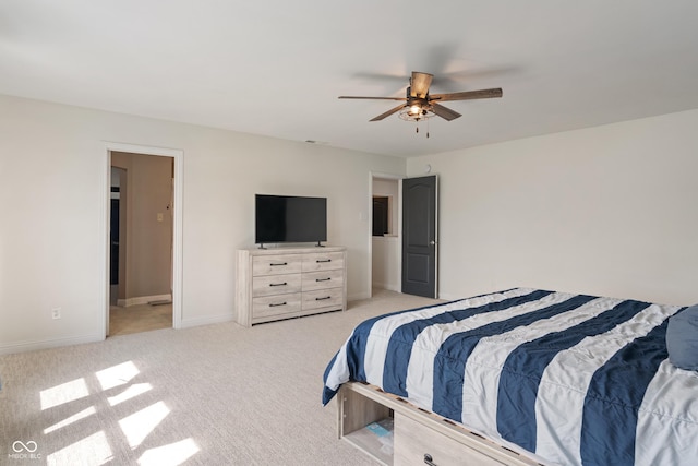 8238 Crackling Ln, Indianapolis, IN 46259 - bedroom with light carpet, baseboards, and ceiling fan
