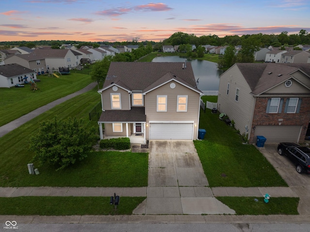 8238 Crackling Ln, Indianapolis, IN 46259 - traditional-style house featuring an attached garage, concrete driveway, and a residential view