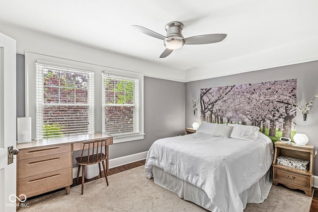 5002 Broadway St, Indianapolis, IN 46205 - bedroom with a desk, light wood-style flooring, baseboards, and ceiling fan