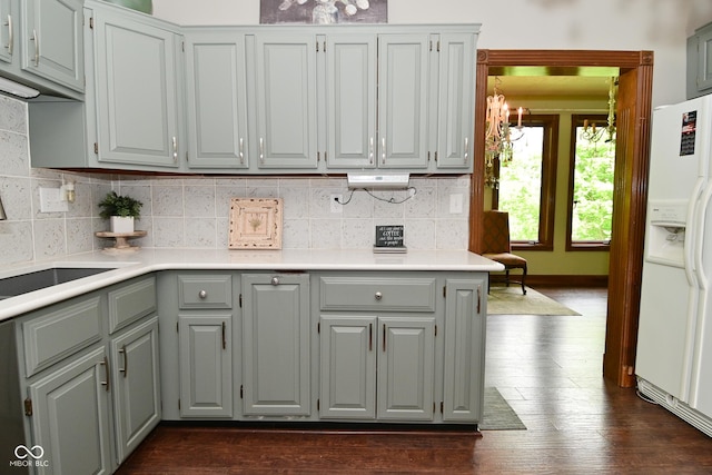 6567 Kings Ct, Avon, IN 46123 - kitchen with white fridge with ice dispenser, gray cabinetry, tasteful backsplash, and light countertops