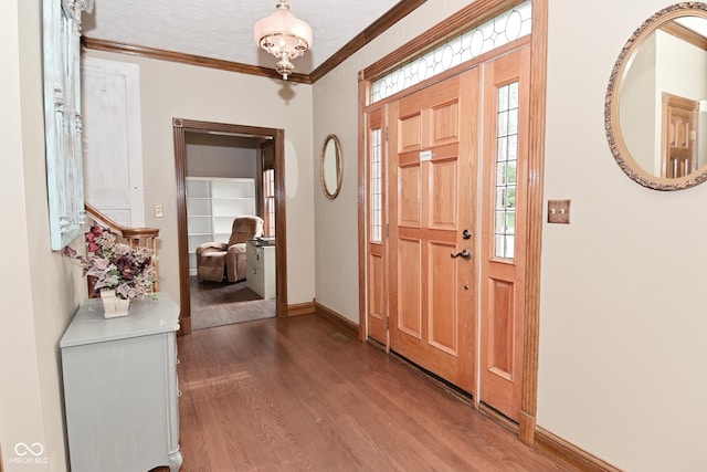 6567 Kings Ct, Avon, IN 46123 - entrance foyer featuring wood finished floors, crown molding, and plenty of natural light