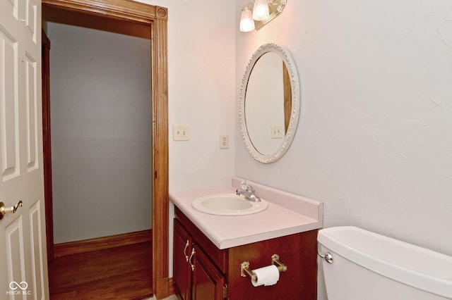 6567 Kings Ct, Avon, IN 46123 - half bath with vanity and wood finished floors
