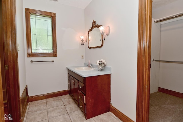 6567 Kings Ct, Avon, IN 46123 - bathroom featuring vanity and tile patterned flooring