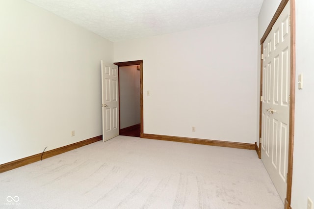 6567 Kings Ct, Avon, IN 46123 - unfurnished room featuring light colored carpet and a textured ceiling