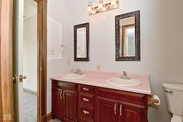 6567 Kings Ct, Avon, IN 46123 - bathroom with double vanity and toilet
