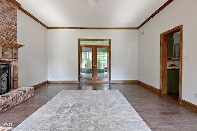 6567 Kings Ct, Avon, IN 46123 - unfurnished living room with wood finished floors, french doors, crown molding, and a brick fireplace