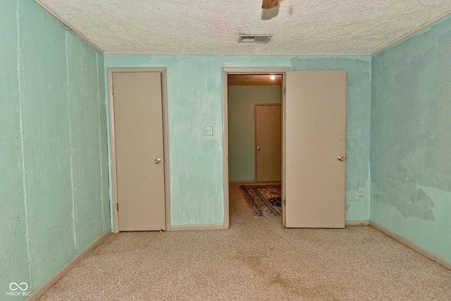 6567 Kings Ct, Avon, IN 46123 - unfurnished bedroom with a textured ceiling and carpet floors