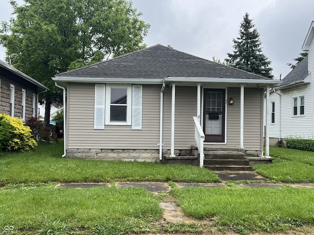 1122 S 21st St, New Castle, IN 47362 - bungalow with a shingled roof and a front yard
