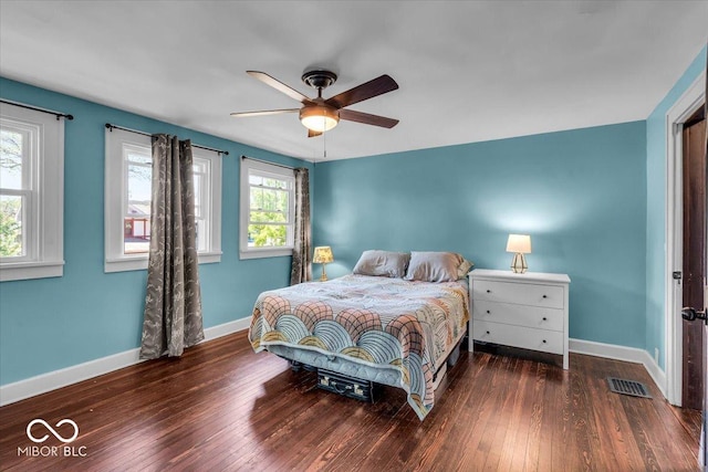 405 N Drexel Ave, Indianapolis, IN 46201 - bedroom with baseboards, hardwood / wood-style floors, and a ceiling fan