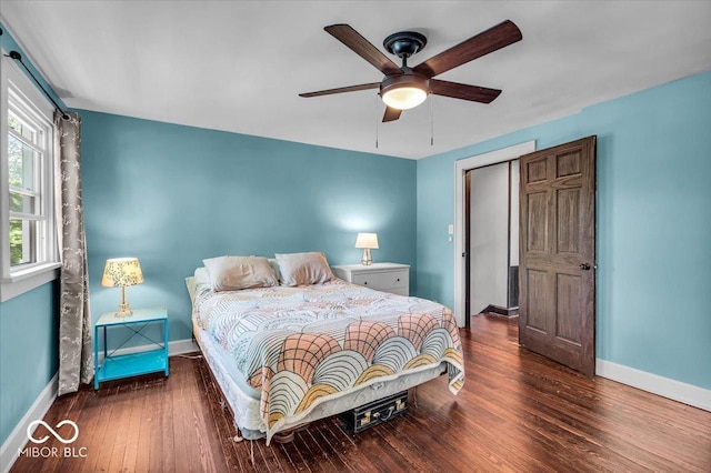 405 N Drexel Ave, Indianapolis, IN 46201 - bedroom featuring baseboards, hardwood / wood-style flooring, and a ceiling fan