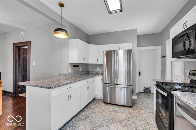 405 N Drexel Ave, Indianapolis, IN 46201 - kitchen with appliances with stainless steel finishes, white cabinets, light stone counters, a peninsula, and hanging light fixtures