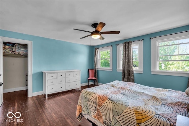 405 N Drexel Ave, Indianapolis, IN 46201 - bedroom with baseboards, wood finished floors, a closet, and ceiling fan