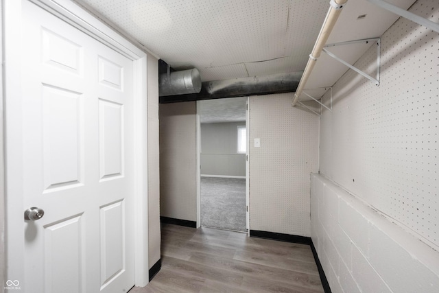 2740 Pawnee Dr, Indianapolis, IN 46229 - walk in closet with wood finished floors