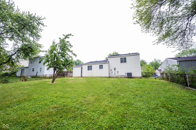 2740 Pawnee Dr, Indianapolis, IN 46229 - rear view of property with central air condition unit