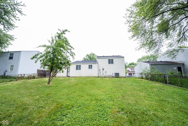 2740 Pawnee Dr, Indianapolis, IN 46229 - back of property featuring central AC
