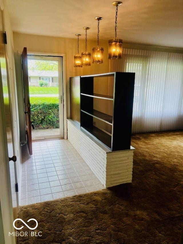 5141 Derome Dr, Fort Wayne, IN 46835 - kitchen with tile patterned floors, a chandelier, carpet flooring, and decorative light fixtures