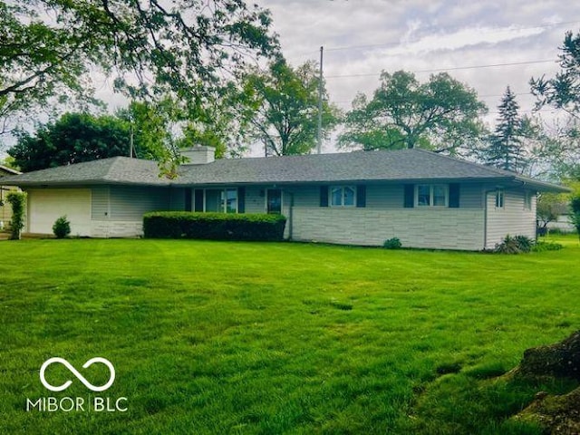 5141 Derome Dr, Fort Wayne, IN 46835 - ranch-style house with a front lawn, stone siding, a garage, and a chimney
