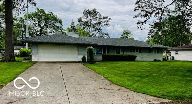 5141 Derome Dr, Fort Wayne, IN 46835 - single story home featuring a garage, driveway, and a front yard