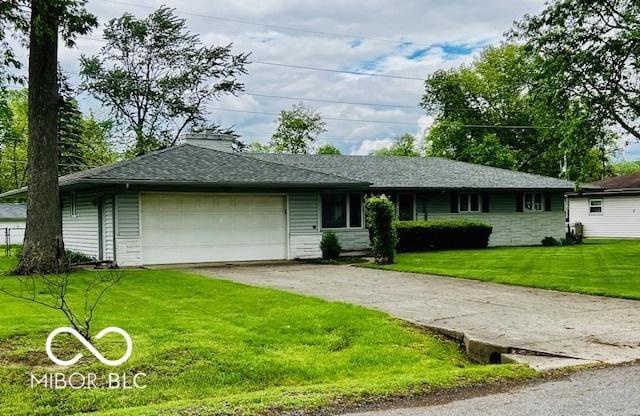 5141 Derome Dr, Fort Wayne, IN 46835 - single story home with driveway, a front yard, and an attached garage