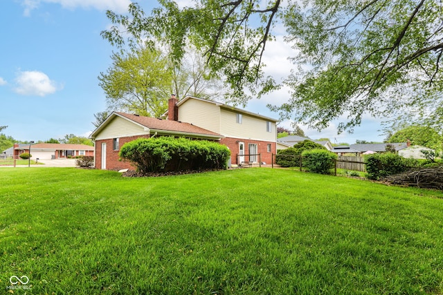3325 Broadview Ct, Indianapolis, IN 46227 - rear view of house with brick siding and a chimney